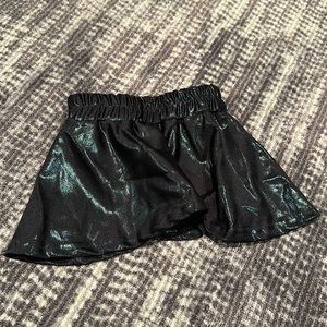 Dori creations black shiny skirt.  Size 2t.  Perfect condition.